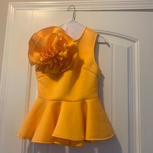 Yellow Gold scuba sleeveless top with big flower.